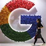 
              FILE - A woman walks past the logo for Google at the China International Import Expo in Shanghai, Monday, Nov. 5, 2018. A top European Union court rejected on Wednesday, Nov. 9, 2021 Google's appeal against a 2.4 billion euro ($2.8 billion) antitrust penalty from the bloc's competition watchdog, which found the company abused its dominant position by giving its shopping service an illegal advantage. (AP Photo/Ng Han Guan, File)
            