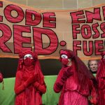 
              Extension Rebellion activists take part in a demonstration against 'Greenwashing' (an attempt to make people believe that your company or government is doing more to protect the environment than it really is) near the COP26 U.N. Climate Summit in Glasgow, Scotland, Wednesday, Nov. 3, 2021. The U.N. climate summit in Glasgow gathers leaders from around the world, in Scotland's biggest city, to lay out their vision for addressing the common challenge of global warming. (AP Photo/Alastair Grant)
            