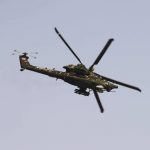 
              A Russian Mil MI-28 attack helicopter flies at the Dubai Air Show in Dubai, United Arab Emirates, Wednesday, Nov. 17, 2021. (AP Photo/Jon Gambrell)
            