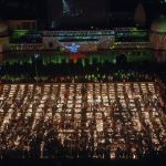 
              People light lamps on the banks of the river Saryu in Ayodhya, India, Wednesday, Nov. 3, 2021. Over 900,000 earthen lamps were lit and were kept burning for 45 minutes as the north Indian city of Ayodhya retained its Guinness World Record for lighting oil lamps as part of the Diwali celebration – the Hindu festival of lights. (AP Photo/Rajesh Kumar Singh)
            