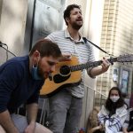 
              Jonathan Wasserman, left, and Adam Masser perform the Tishrei Niggun, a wordless Jewish melody often sung on the high holidays, during the Faiths for Climate Justice global mobilization event organized by the GreenFaith International Network on Sunday, Oct. 17, 2021, at Hebrew Tabernacle synagogue in New York. Religious activists in 43 countries around the world carried out over 500 actions in two days to call for an end to new fossil fuel projects and deforestation two weeks prior to the United Nations Climate Change Conference in Glasgow, Scotland. (AP Photo/Jessie Wardarski)
            