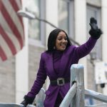 
              Mickey Guyton rides on a float during the Macy's Thanksgiving Day Parade, Thursday, Nov. 25, 2021, in New York. The Macy's Thanksgiving Day Parade returned in full, after being crimped by the coronavirus pandemic last year. (AP Photo/Jeenah Moon)
            