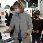 
              Allison Russo, Democratic candidate for 15th Congressional District, casts her ballot Tuesday, Nov. 2, 2021, in Upper Arlington, Ohio. (AP Photo/Jay LaPrete)
            
