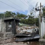 
              An entrances to the army barracks is blocked by a barricade placed there by residents in  Aguililla, in the Michoacan state of Mexico, Friday, Oct. 29, 2021. Residents say they won’t let the soldiers out of their barracks until the army does its job of clearing the Viagra cartel roadblocks that make everything — medical care, food, fuel, electrical or telephone repairs — impossible or expensive to get. (AP Photo/Eduardo Verdugo)
            