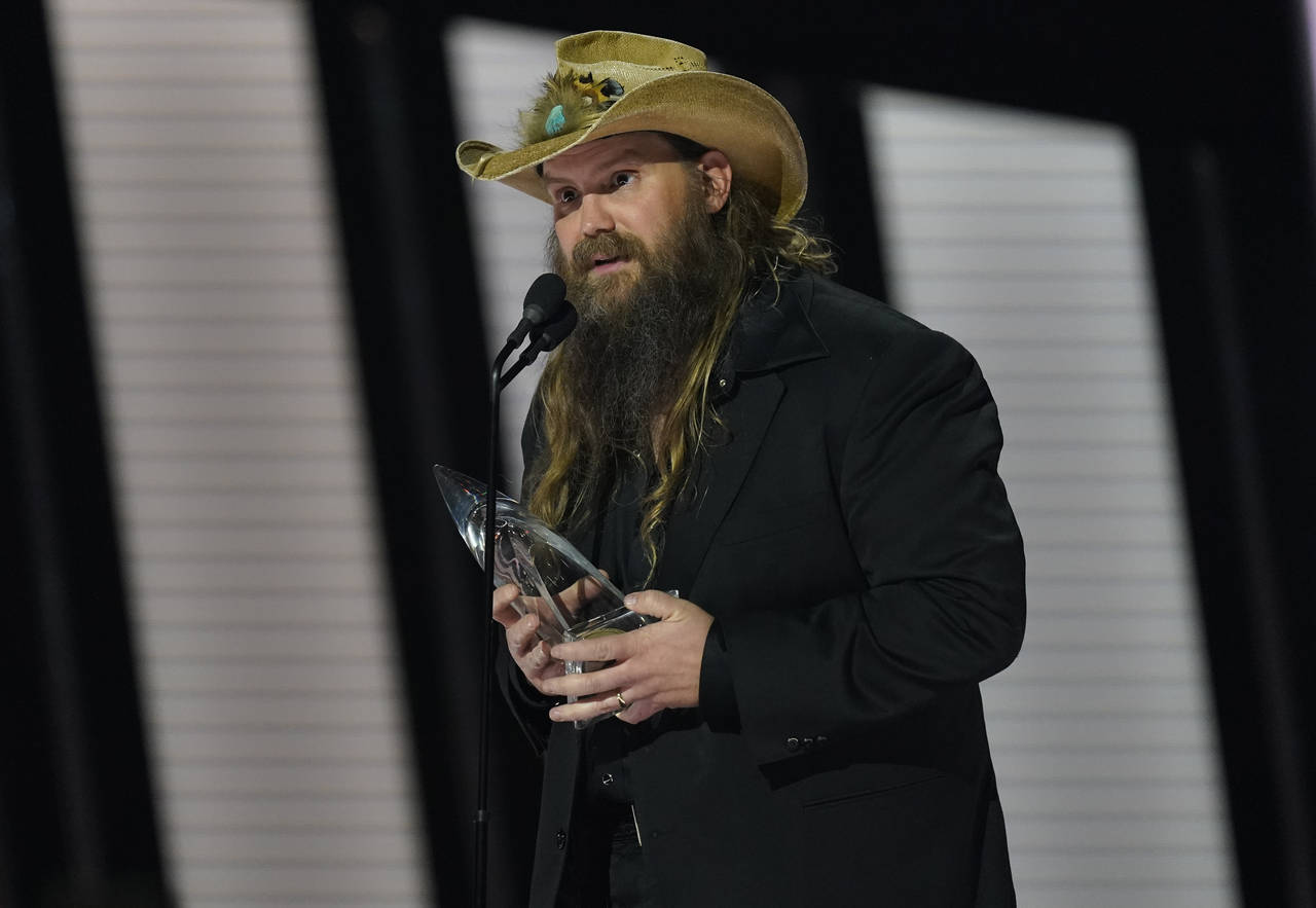 Chris Stapleton accepts the award for male vocalist of the year at the 55th annual CMA Awards on We...