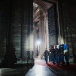 
              Six carriers of the Air Force and Space carry the cenotaph of Josephine Baker, covered with the French flag, into the Pantheon in Paris, France, Tuesday, Nov. 30, 2021, where she is to symbolically be inducted, becoming the first Black woman to receive France's highest honor. Her body will stay in Monaco at the request of her family. (Thibault Camus/Pool Photo via AP)
            