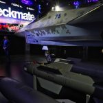 
              Russian officials unveil a mockup of the Sukhoi Su-75 Checkmate stealth fighter jet, a competitor to the American F-35, at the Dubai Air Show in Dubai, United Arab Emirates, Sunday, Nov. 14, 2021. The biennial Dubai Air Show opened Sunday as commercial aviation tries to shake off the coronavirus pandemic. (AP Photo/Jon Gambrell)
            