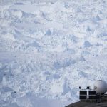 
              FILE - A woman stands next to an antenna at an NYU base camp at the Helheim glacier in Greenland on Friday, Aug. 16, 2019. An increasingly large number of studies link Arctic changes to alterations of the jet stream — the river of air that moves weather from west to east — and other weather systems. And those changes, scientists say, can contribute to more extreme weather events, such as floods, drought, the February Texas freeze, or more severe wildfires. (AP Photo/Felipe Dana, File)
            