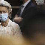 
              European Commission President Ursula von der Leyen waits for her car at the end of an Eastern Partnership Summit in Brussels, Wednesday, Dec. 15, 2021. European Union leaders met with partner nations on its eastern borders on Wednesday, with the Russian military buildup on Ukraine's border as the main point of focus. (AP Photo/Olivier Matthys, Pool)
            