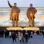 
              Citizens visit the bronze statues of their late leaders Kim Il Sung, left, and Kim Jong Il on Mansu Hill in Pyongyang, North Korea Thursday, Dec. 16, 2021, on the occasion of 10th anniversary of demise of Kim Jong Il. (AP Photo/Cha Song Ho)
            