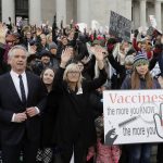 
              FILE - Robert F. Kennedy, Jr., left, stands with protesters at the Capitol in Olympia, Wash., on Feb. 8, 2019, where they opposed a bill to tighten measles, mumps and rubella vaccine requirements for school-aged children. He carved out a career as a bestselling author and top environmental lawyer fighting for important public health priorities such as clean water. His work as a leading voice in that movement likely would have been his legacy, but more than 15 years ago, he became fixated on a belief that vaccines are not safe, despite overwhelming scientific consensus that they are. (AP Photo/Ted S. Warren, File)
            