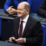 
              Olaf Scholz of the Social Democrats reacts after he was elected new German Chancellor in the German Parliament Bundestag in Berlin, Wednesday, Dec. 8, 2021. The election and swearing-in of the new Chancellor and the swearing-in of the federal ministers of the new federal government will take place in the Bundestag on Wednesday. (Photo/Stefanie Loos)
            