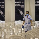 
              FILE - A worker disinfects chairs at a new vaccination center in Lisbon, Tuesday, Nov. 30, 2021. A pandemic-weary world faces weeks of confusing uncertainty as countries restrict travel and take other steps to halt the newest potentially risky coronavirus mutant before anyone knows just how dangerous omicron really is.  (AP Photo/Armando Franca, File)
            