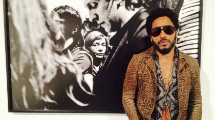 FILE - In this image taken from video, Musician Lenny Kravitz stands in front of one of his photos ...