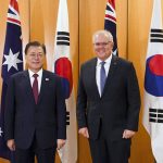 
              South Korean President Moon Jae-in, left, and Australian Prime Minister Scott Morrison pose for a photo at Parliament House, in Canberra, Australia, Monday, Dec. 13, 2021. Moon is on a two-day official visit to Australia. (Lukas Coch/Pool Photo via AP)
            