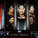 
              Image of U.S.-born entertainer, anti-Nazi spy and civil rights activist Josephine Baker is projected on the Pantheon monument during a ceremony in Paris, France, Tuesday, Nov. 30, 2021, where she is to symbolically be inducted, becoming the first Black woman to receive France's highest honor. Her body will stay in Monaco at the request of her family. (Thibault Camus/Pool Photo via AP)
            