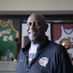 
              Former professional basketball player and Olympic gold medalist Spencer Haywood in front of his basketball memorabilia at his Las Vegas home Monday, Nov. 29, 2021. If there was a decade when the NBA nearly disintegrated under the weight of its own problems, the 1970s was that decade. Haywood said fights broke out essentially "every other night, and for no real reason." (AP Photo/Ellen Schmidt)
            