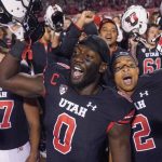 
              FILE - Utah linebacker Devin Lloyd (0) celebrates with teammates following an NCAA college football game against Arizona State on Oct. 16, 2021, in Salt Lake City. (AP Photo/Rick Bowmer, File)
            