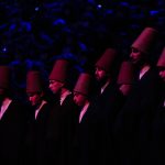 
              Whirling dervishes of the Mevlevi order perform during a Sheb-i Arus ceremony in Konya, central Turkey on Friday, Dec. 17, 2021. Every December the Anatolian city hosts a series of events to commemorate the death of 13th century Islamic scholar, poet and Sufi mystic Jalaladdin Rumi. (AP Photo/Francisco Seco)
            