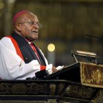 
              FILE - South African Archbishop Emeritus Desmond Tutu makes an address at Westminster Abbey in London during the memorial service for the former South African President Nelson Mandela, Monday March 3, 2014. Tutu, South Africa’s Nobel Peace Prize-winning activist for racial justice and LGBT rights and retired Anglican Archbishop of Cape Town, has died, South African President Cyril Ramaphosa announced Sunday Dec. 26, 2021. He was 90. (John Stillwell, Pool Photo via AP, File)
            
