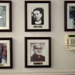 
              Portraits of past priests hang on the walls of Holy Family Catholic Church in Lanett, Ala., on Saturday, Dec. 11, 2021. The Catholic Diocese of Birmingham and dioceses across the country continue to experience a large priest shortage. (AP Photo/Jessie Wardarski)
            