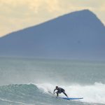 
              A man surfs at Maresias beach, in Sao Sebastiao, Brazil, Friday, Nov. 26, 2021. Maresias and the surf towns dotting the coastline are inside the Serra do Mar park, which Sao Paulo state says is Brazil’s largest continuous protected area of Atlantic Forest. It acts as a barrier to the urban sprawl of the Sao Paulo metropolitan area. (AP Photo/Andre Penner)
            