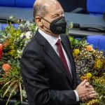 
              Olaf Scholz of the Social Democrats receives applause from lawmakers after he was elected new German Chancellor in the German Parliament Bundestag in Berlin, Wednesday, Dec. 8, 2021. The election and swearing-in of the new Chancellor and the swearing-in of the federal ministers of the new federal government will take place in the Bundestag on Wednesday. (Photo/Stefanie Loos)
            