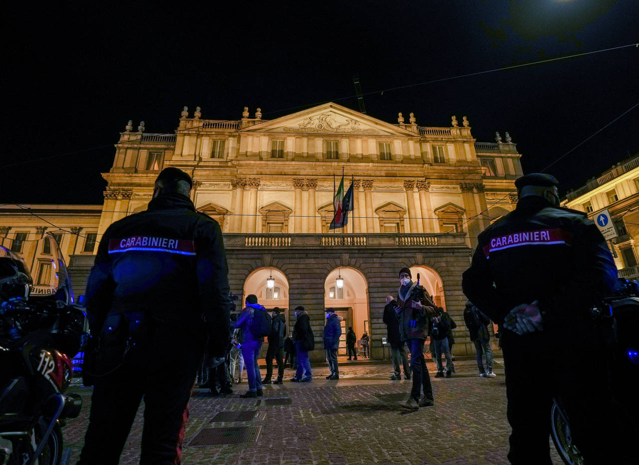 Italian Carabinieri police patrol outside La Scala opera house for the premiere of Verdi's Macbeth ...