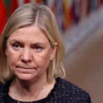 
              Sweden's Prime Minister Magdalena Andersson speaks with the media as she arrives for an EU Summit at the European Council building in Brussels, Thursday, Dec. 16, 2021.European Union leaders meet for a one-day summit Thursday that will center on Russia's military threat to neighbouring Ukraine and on ways to deal with the continuing COVID-19 crisis. (Kenzo Tribouillard, Pool Photo via AP)
            