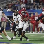 
              Alabama running back Trey Sanders (6) runs for a first down against Cincinnati during the second half of the Cotton Bowl NCAA College Football Playoff semifinal game, Friday, Dec. 31, 2021, in Arlington, Texas. (AP Photo/Michael Ainsworth)
            