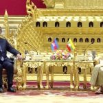 
              In this image taken from video broadcast by Myanmar state broadcaster MRTV, Cambodian Prime Minister Hun Sen, left, and Myanmar State Administration Council Chairman, Senior General Min Aung Hlaing hold a meeting in Naypyitaw, Myanmar, Friday Jan. 7, 2022. Cambodian Prime Minister Hun Sen’s visit to Myanmar seeking to revive peace efforts after last year's military takeover has provoked an angry backlash among critics, who say he is legitimizing the army’s seizure of power. (MRTV via AP)
            