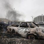 
              A car, which was burned after clashes, is seen on a street in Almaty, Kazakhstan, Friday, Jan. 7, 2022. Kazakhstan's president authorized security forces on Friday to shoot to kill those participating in unrest, opening the door for a dramatic escalation in a crackdown on anti-government protests that have turned violent. The Central Asian nation this week experienced its worst street protests since gaining independence from the Soviet Union three decades ago, and dozens have been killed in the tumult. (AP Photo/Vasily Krestyaninov)
            