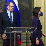 
              In this handout photo released by Russian Foreign Ministry Press Service, Russian Foreign Minister Sergey Lavrov and German Foreign Minister Annalena Baerbock leave a joint news conference following their talks in Moscow, Russia, Tuesday, Jan. 18, 2022. (Russian Foreign Ministry Press Service via AP)
            