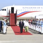 
              In this photo provided by An Khoun Sam Aun/National Television of Cambodia, Cambodian Prime Minister Hun Sen, center left, reviews an honor guard with Myanmar Foreign Minister Wunna Maung Lwin, center right, on his arrival at Naypyitaw International Airport in Naypyitaw, Myanmar, Friday, Jan 7, 2022. (An Khoun Sam Aun/National Television of Cambodia via AP)
            