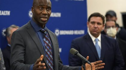 Florida Surgeon Gen. Dr. Joseph A. Ladapo, left, speaks at a news conference with Florida Gov. Ron ...