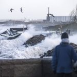 
              High water levels at the Oresund coast, Malmo, Sweden, Sunday Jan. 30, 2022, after a powerful winter storm swept through northern Europe over the weekend. Storm Malik was advancing in the Nordic region on Sunday, bringing strong gusts of wind, and extensive rain and snowfall in Denmark, Finland, Norway and Sweden. (Johan Nilsson/TT via AP)
            