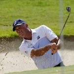 
              Matt Kuchar hits out of the first bunker during the final round of the Sony Open golf tournament, Sunday, Jan. 16, 2022, at Waialae Country Club in Honolulu. (AP Photo/Matt York)
            