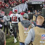 
              Tampa Bay Buccaneers quarterback Tom Brady (12) walks off the field following a loss during an NFL divisional playoff football game against the Los Angeles Rams, Sunday, Jan. 23, 2022 in Tampa, Fla. Despite reports that he is retiring, Brady has told the Tampa Bay Buccaneers he hasn't made up his mind, two people familiar with the details told The Associated Press, Saturday, Jan. 29, 2022. (AP Photo/Alex Menendez)
            