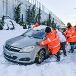 
              Firemen push a trapped vehicle at a motorway, after a snowstorm, in Athens, on Tuesday, Jan. 25, 2022. Rescue crews in Istanbul and Athens scrambled on Tuesday to clear roads that came to a standstill after a massive cold front and snowstorms hit much of Turkey and Greece, leaving countless people and vehicles in both cities stranded overnight in freezing conditions. (AP Photo/Michael Varaklas)
            