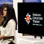 Indian Country Today executive producer and news broadcaster Patty Talahongva speaks during a news broadcast taping Friday, Sept. 10, 2021, in Phoenix.  Native American communities have seen more robust news coverage in recent years, in part because of an increase in Indigenous affairs reporting positions at U.S. newsrooms and financial support from foundations. (AP Photo/Ross D. Franklin)
