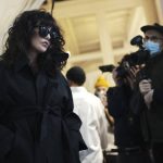 
              French actress Isabelle Adjani poses backstage prior to the Ami fall-winter 22/23 men's collection, in Paris, Wednesday, Jan. 19, 2022. (AP Photo/Lewis Joly)
            