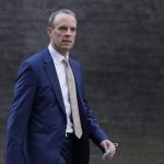 
              Britain's Deputy Prime Minister Dominic Raab arrives at 10 Downing Street in London, Tuesday, Jan. 18, 2022. (AP Photo/Alastair Grant)
            