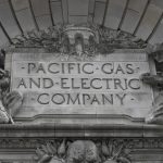 
              FILE - In this April 16, 2020, file photo, a Pacific Gas & Electric sign is displayed on the exterior of a PG&E building in San Francisco. The nation's largest utility, Pacific Gas & Electric is poised to emerge from five years of criminal probation amid worries that it remains too dangerous to be trusted. Over the five years, the utility became an even more destructive force. More than 100 people have died and thousands of homes and businesses have been incinerated in wildfires sparked by its equipment in that time. (AP Photo/Jeff Chiu, File)
            