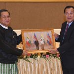 
              In this photo provided by An Khoun Sam Aun/National Television of Cambodia, Cambodian Prime Minister Hun Sen, right, and Myanmar State Administration Council Chairman, Senior General Min Aung Hlaing, left, hold a souvenir photo showing them, after a meeting in Naypyitaw, Myanmar, Friday Jan. 7, 2022. Cambodian Prime Minister Hun Sen's visit to Myanmar seeking to revive peace efforts after last year's military takeover has provoked an angry backlash among critics, who say he is legitimizing the army's seizure of power. (An Khoun SamAun/National Television of Cambodia via AP)
            