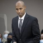 
              FILE - Former officer Mohamed Noor makes his way to the podium to address Judge Kathryn Quaintance at the Hennepin County Government Center on Oct. 21, 2021 in Minneapolis. The Minneapolis police officer who fatally shot an unarmed woman after she called 911 to report a possible rape happening behind her home was sentenced to nearly five years in prison. Data show it's rare for police officers to be convicted of on-duty killings. But three recent convictions of police officers in Minnesota have some people wondering whether that's changing. (Elizabeth Flores/Star Tribune via AP, Pool, File)
            
