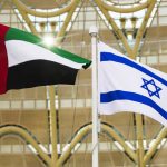 
              The Emirati and Israeli flags fly overhead as Israeli President Isaac Herzog gives a speech at Expo 2020 in Dubai, United Arab Emirates, Monday, Jan. 31, 2022. The UAE intercepted a ballistic missile fired by Yemen's Houthi rebels early Monday as the Israeli president visited the country, authorities said, the third such attack in recent weeks. (AP Photo/Jon Gambrell)
            