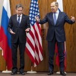 
              U.S. Secretary of State Antony Blinken, left, and Russian Foreign Minister Sergei Lavrov, right, gestures prior to their meeting in Geneva, Switzerland, Friday, Jan. 21, 2022. (Martial Trezzini/Keystone via AP)
            
