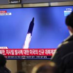 
              People watch a TV screen showing a news program reporting about North Korea's missile launch with a file image, at a train station in Seoul, South Korea, Friday, Jan. 14, 2022. North Korea on Friday fired two short-range ballistic missiles in its third weapons launch this month, officials in South Korea said, in an apparent reprisal for fresh sanctions imposed by the Biden administration for its continuing test launches. (AP Photo/Lee Jin-man)
            