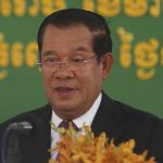
              FILE - Cambodian Prime Minister Hun Sen delivers a speech during a handover ceremony at Phnom Penh International Airport, in Phnom Penh, Cambodia on Feb. 7, 2021. Hun Sen begins a visit to strife-torn Myanmar on Friday, Jan. 7,  that he hopes will invigorate efforts by Southeast Asian nations to start a peace process, but critics say will legitimize the rule of the military that took power last year and its campaign of violence. (AP Photo/Heng Sinith, File)
            