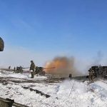 
              In this photo taken from video provided by the Russian Defense Ministry Press Service on Friday, Jan. 28, 2022, Russian troops fire howitzers during drills in the Rostov region during a military exercising at a training ground in Rostov region, Russia. (Russian Defense Ministry Press Service via AP)
            